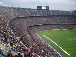Daytime event in a large outdoor stadium that is dedicated to zero waste and environmental responsibility