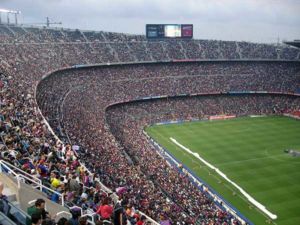 Daytime event in a large outdoor stadium that is dedicated to zero waste and environmental responsibility