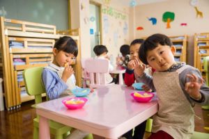 Pre-school-aged children in an Early Childhood Education - Program classroom that provides programs for enhanced social skills and school readiness