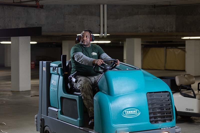 Marsden associate performing industrial facility services floor care