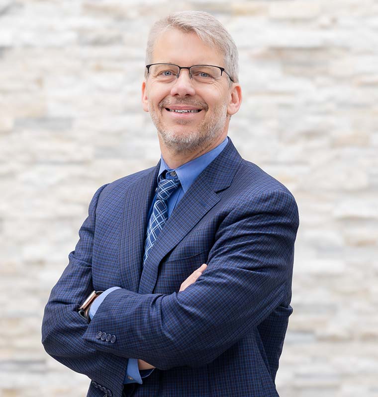 Damon Fraser, Chief Legal & Administrative Officer and Corporate Secretary